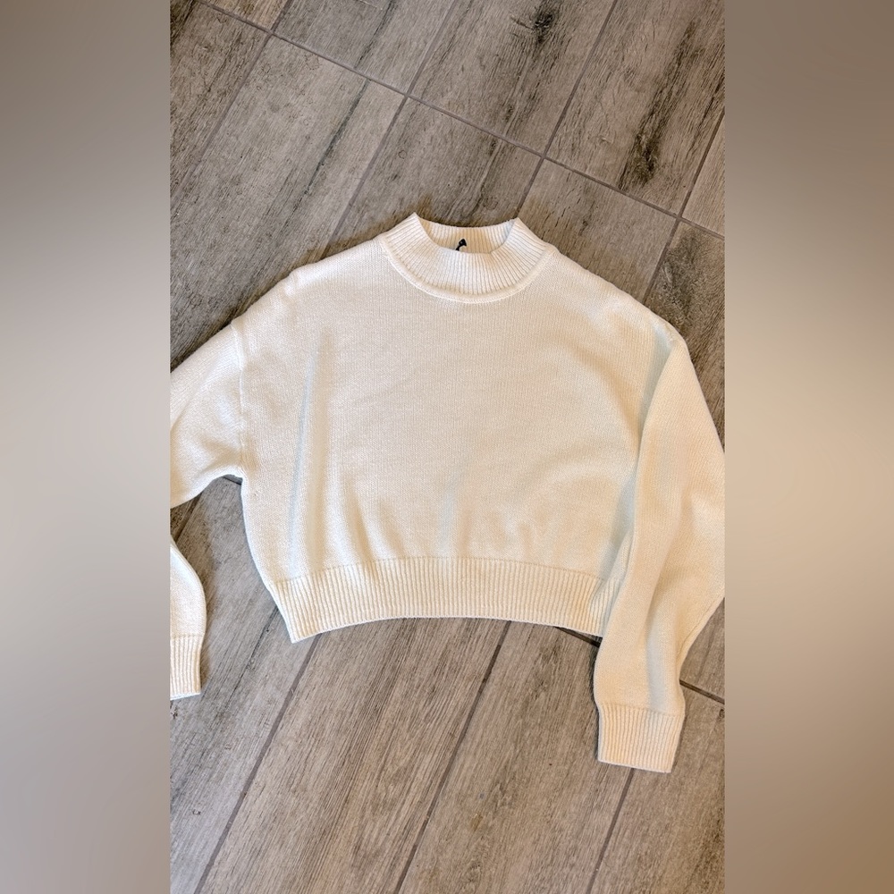 Divided brand pretty cream color cropped sweater.